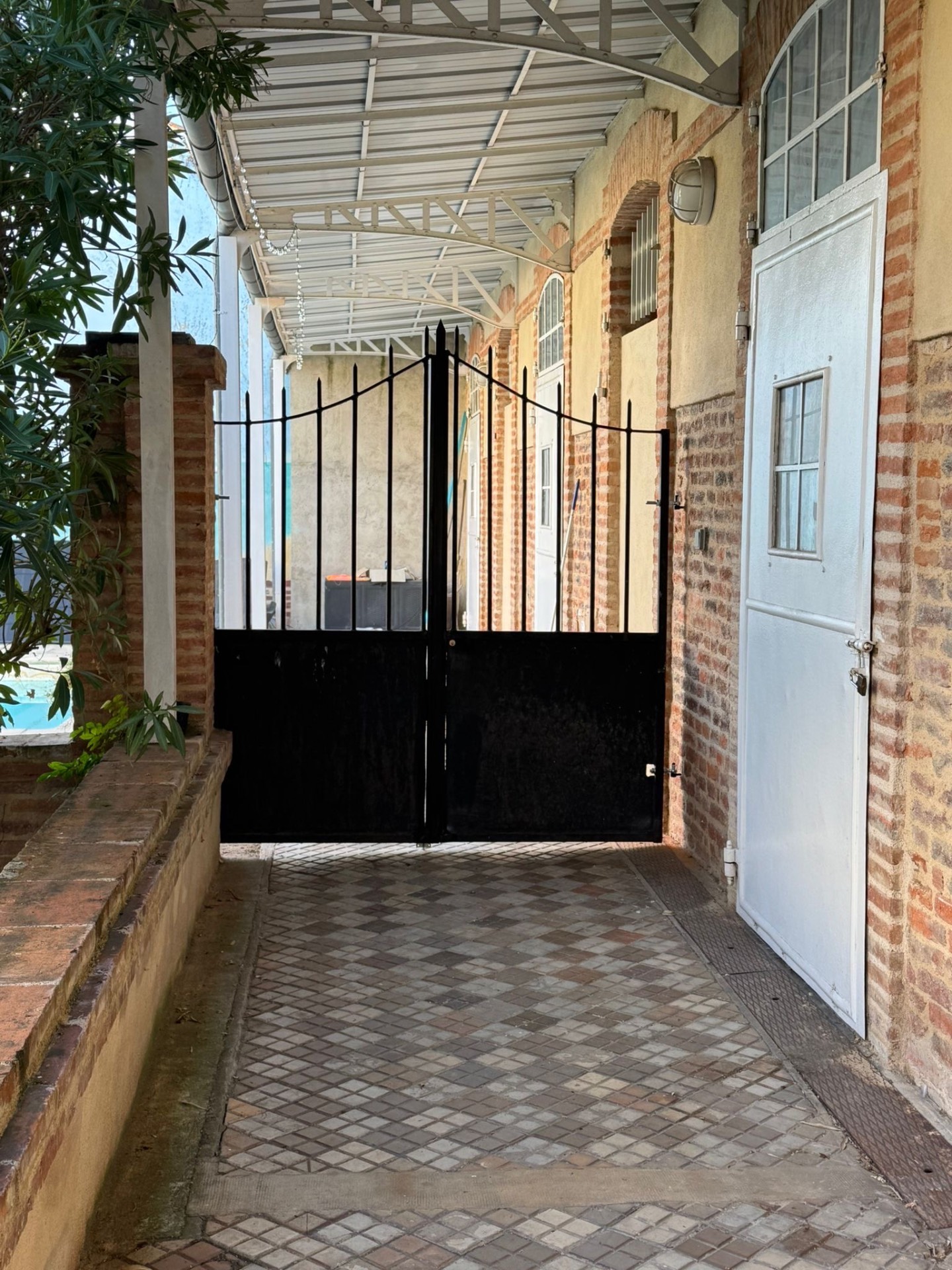 Portail fer forgé